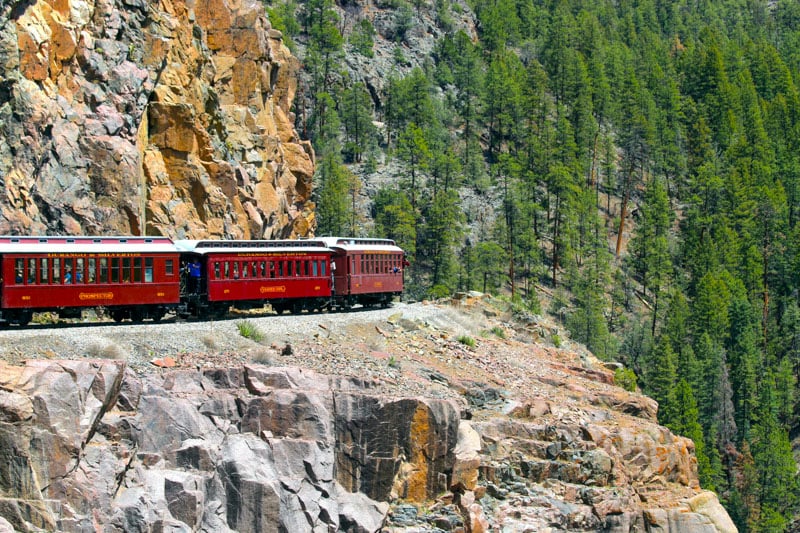 The Durango & Silverton Narrow Gauge Railroad offers a scenic ride through the San Juan Mountains to Silverton.