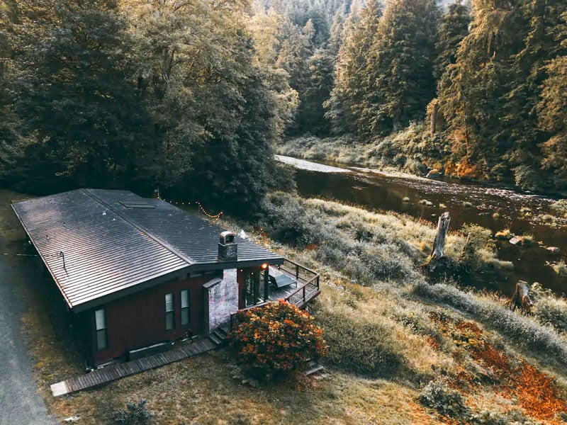 Mid-Century Riverfront Cabin, Tillamook, Oregon is one of the most beautiful Airbnb cabins in the USA.