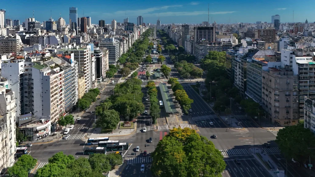 High-angle view of Avenida 9 de Julio in Buenos Aires stretching through city skyscrapers
