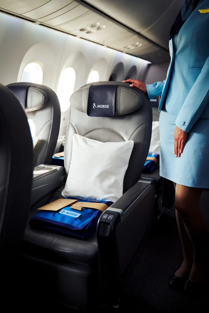 Norse Atlantic Airways Premium seat with pillow, blanket, and amenities