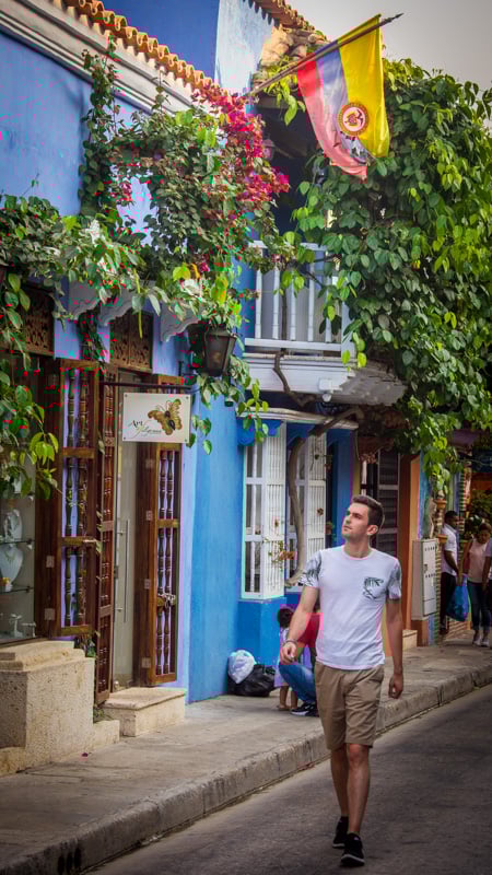 My photo of me walking along a colorful street in Cartagena