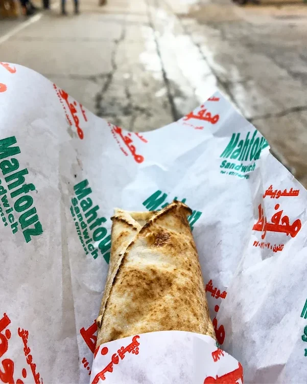 Mahfouz sandwich fatayel wrapped in branded paper in Tyre Lebanon Old Souk