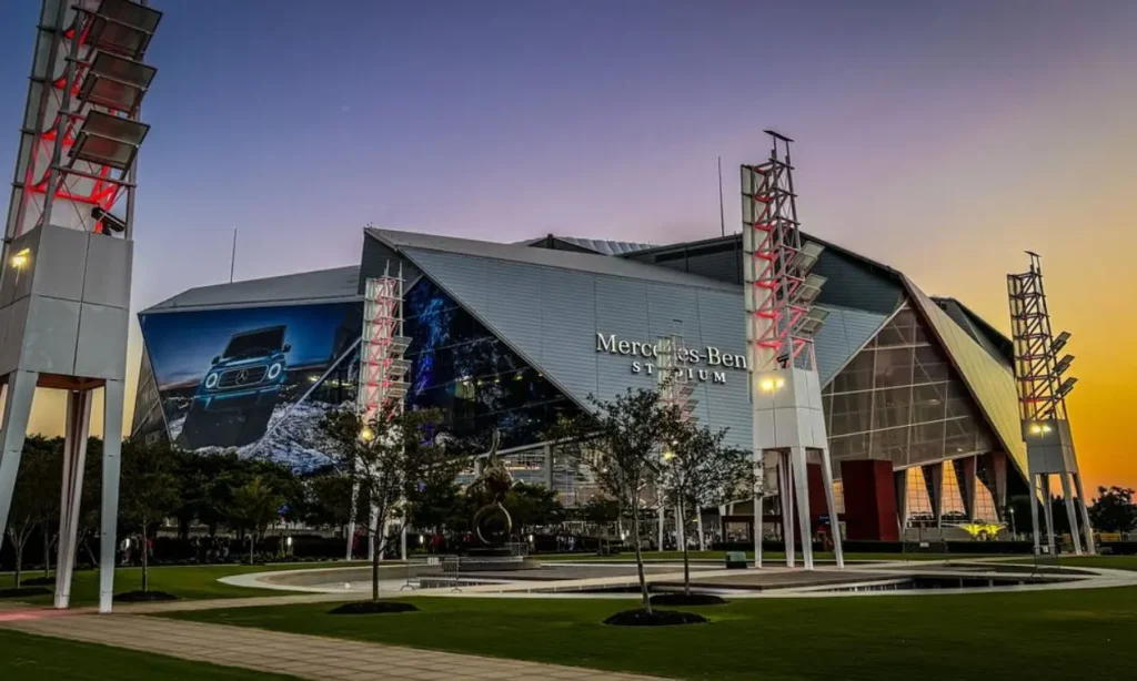 Mercedes-Benz Stadium exterior view at sunset.