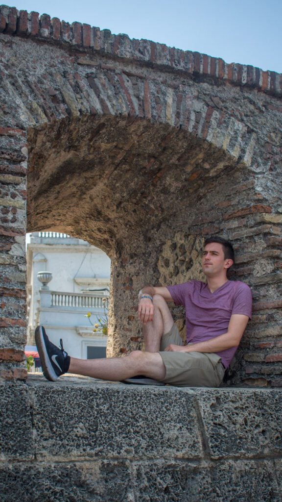 Me sitting on Old Cartagena's historic walls