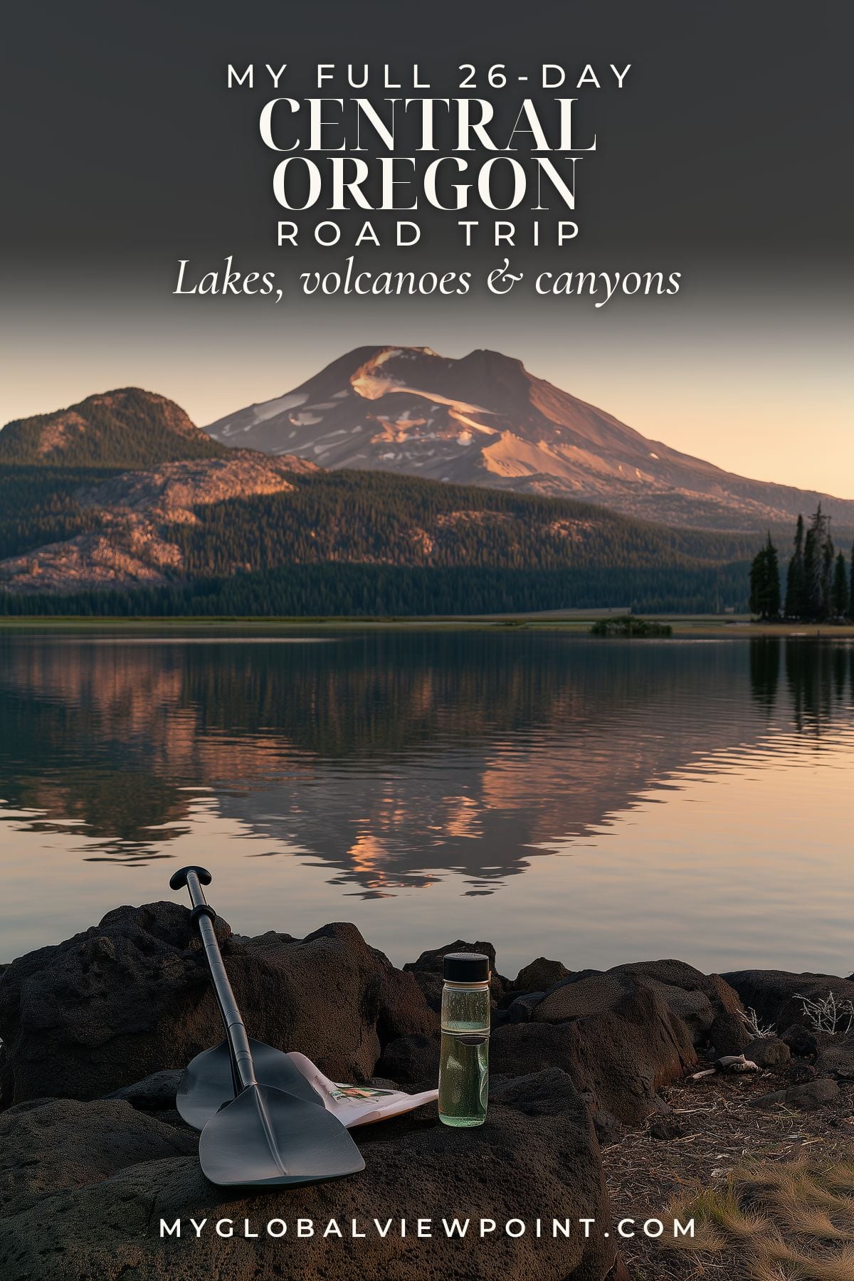 Central Oregon road trip pin with a paddle and water bottle beside a lake reflecting a mountain.