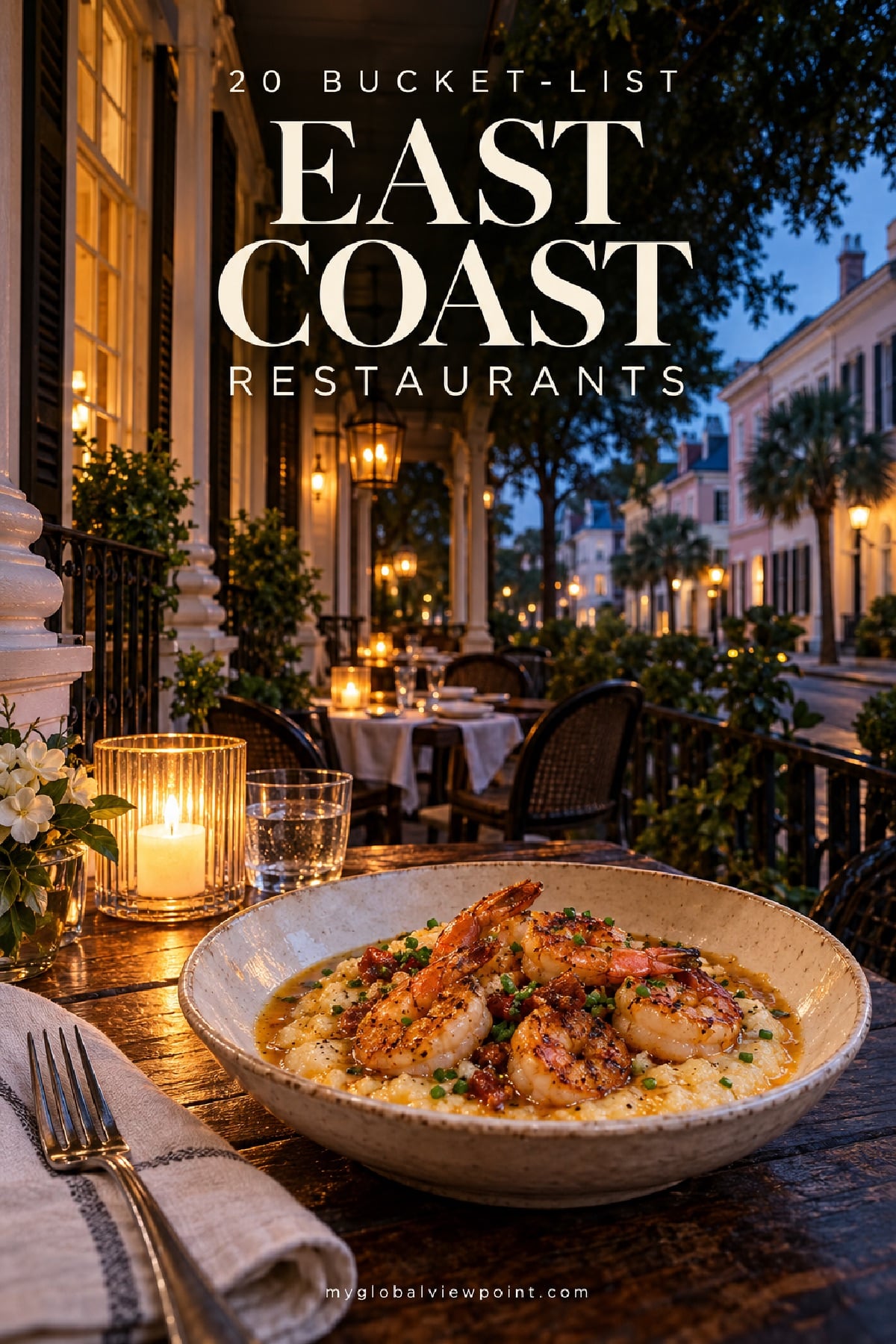 A candlelit table on a Charleston-style piazza at dusk, with a bowl of shrimp and grits in the foreground