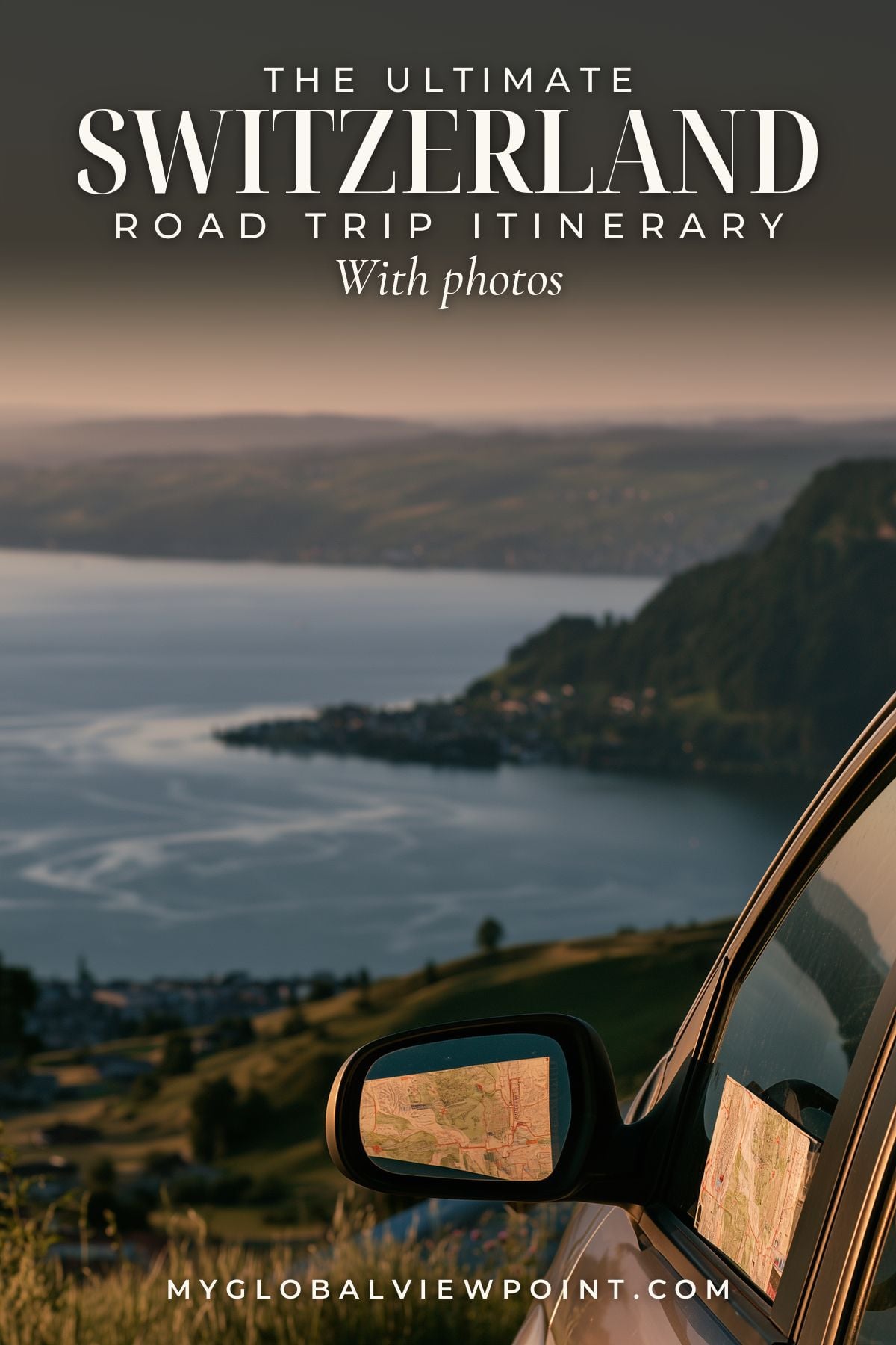Switzerland road trip pin with a map and car mirror overlooking a lake and wooded hills.