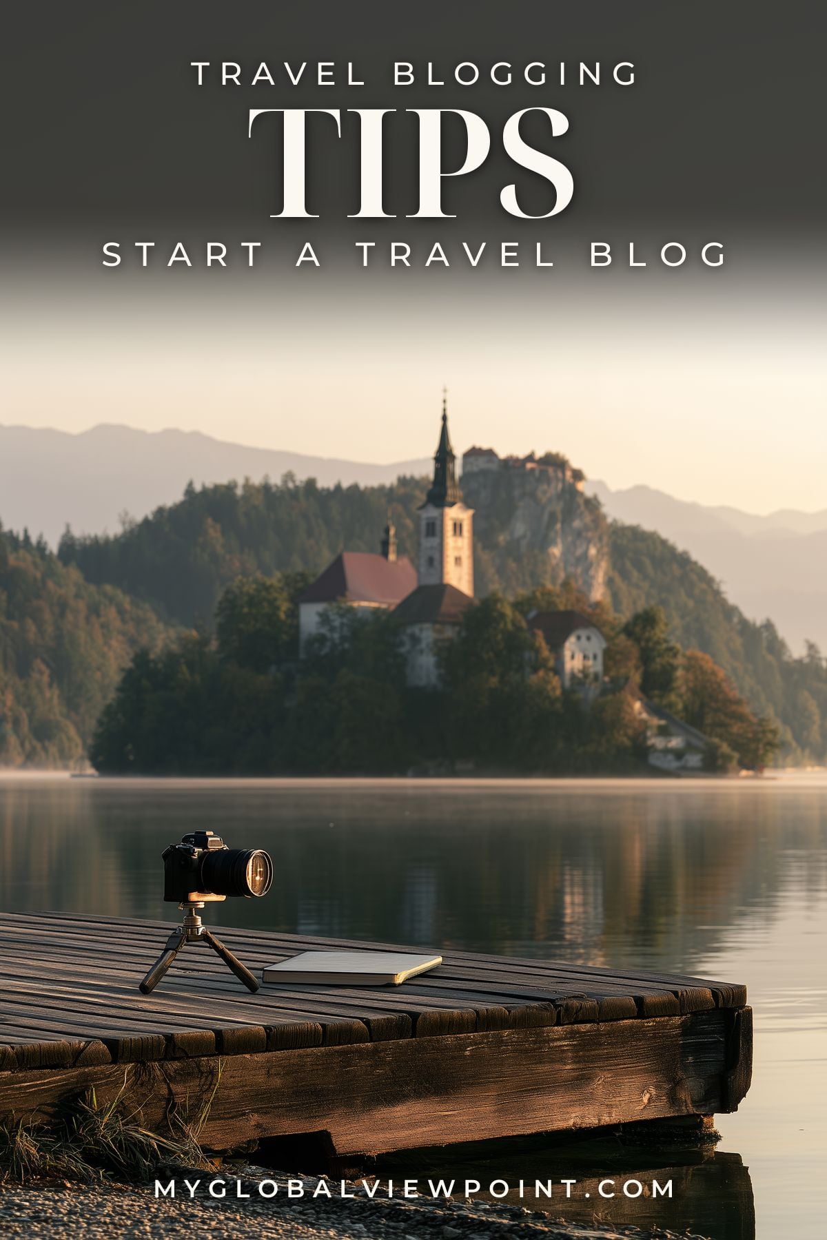 Travel blogging tips pin with a camera and notebook beside a lake facing an island church.