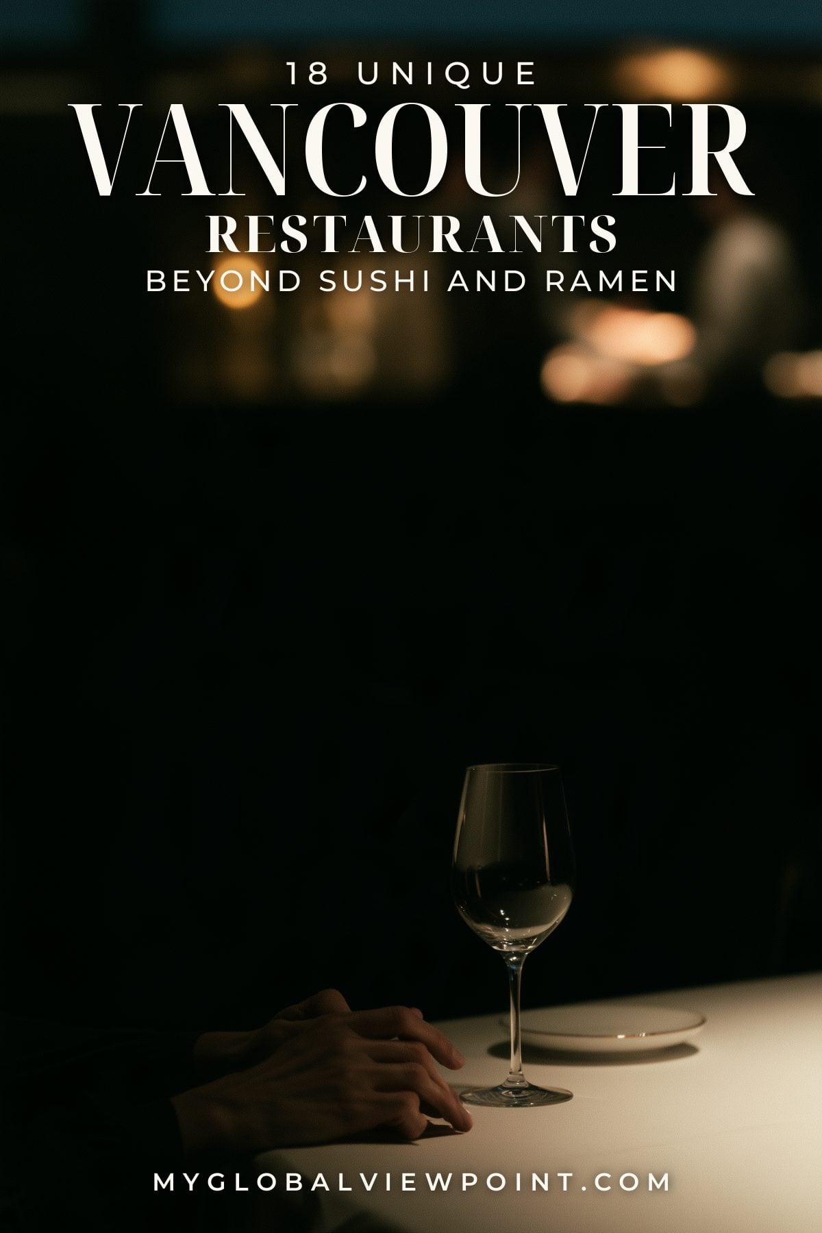 Pinterest travel graphic showing a place setting and wine glass in a dark dining room.